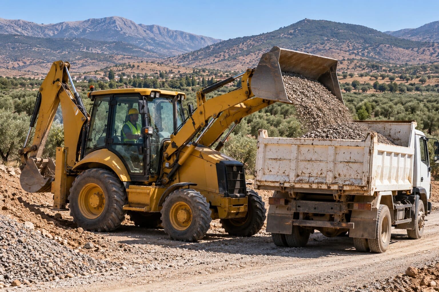 Tractopelle CAT 428 (8,3 tonnes) en location au Maroc – BLUEBLOCK